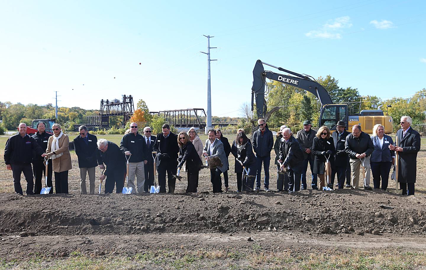 Ottawa YMCA board members, politicans, donors, and other guests of honor shovel dirt during the Ottawa YMCA  groundbreaking ceremony for the new YMCA on Tuesday, Oct. 18, 2022 in Ottawa.