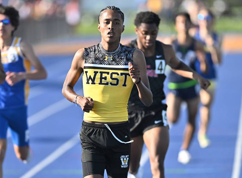 Joliet West's Marcellus Mines wins the heat in the 800 meter event during the IHSA 3A Sectional track meet  on Friday, May. 17, 2024, at Joliet.