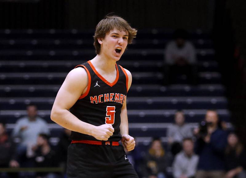 McHenry's Kyle Maness celebrates a McHenry takes lead back after a three-pointer against Hononegah during the IHSA Class 4A Guilford Boys Basketball Sectional semifinal game on Wednesday, Feb. 28, 2024, at Rock Valley College in Rockford.