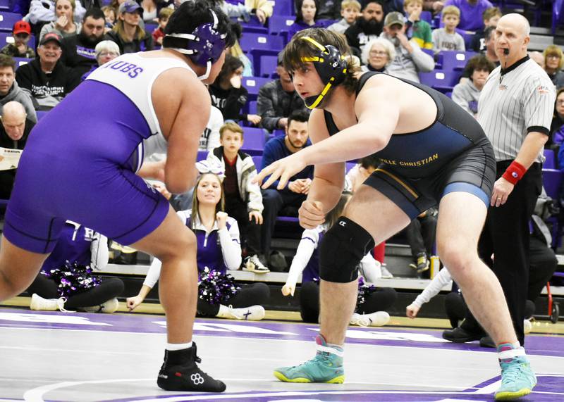 Yorkville Christian’s Garrett Tunnell stares down Rochelle’s Frank Decena during Tuesday’s IHSA Class 2A Dual Team Sectional match at Rochelle.