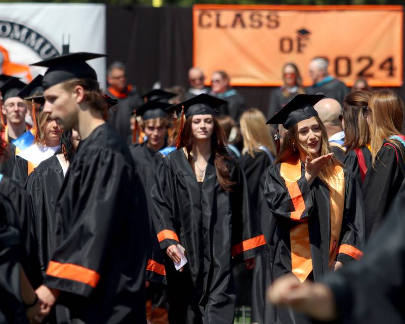 Members of the Class of 2024 march to McHenry High School’s 104th Annual Commencement at McCracken Field on Saturday.