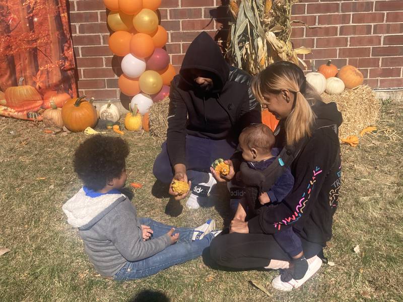 Antonio and Teetee Lopez with their sons Darrell and Antonio Jr. at the Sator Sanchez Elementary at the pumpkin farm set up by local pumpkin farms at the Joliet school on Friday. Oct. 18, 2024.