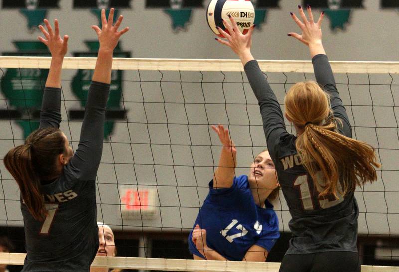 Woodstock’s Allison O’Brien hits the ball against Prairie Ridge in IHSA Class 3A sectional semifinal volleyball action at Woodstock North Monday.