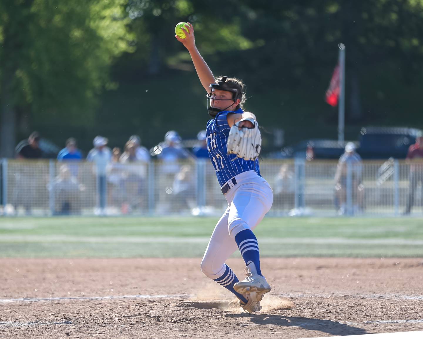 St. Charles North's Ava Goettel (17) delivers a pitch during the Class 4A Glenbard West Regional championship game May 26, 2023.