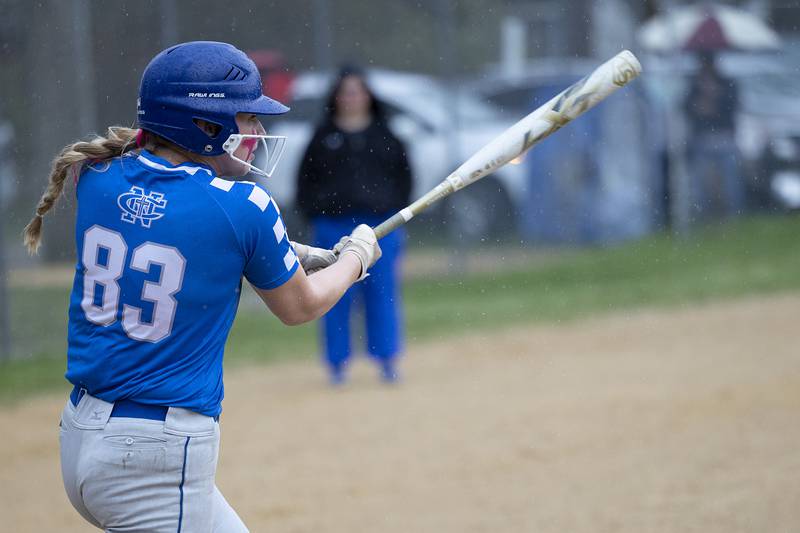 Newman’s Jess Johns makes contact against Dixon Thursday, April 11, 2024 at Reynolds Field in Dixon.