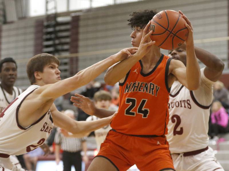 McHenry's Adam Anwar looks to pass as he is defended by Antioch’s Joel Bulka during a nonconference basketball game Thursday, Jan. 4. 2024, at Antioch High School.
