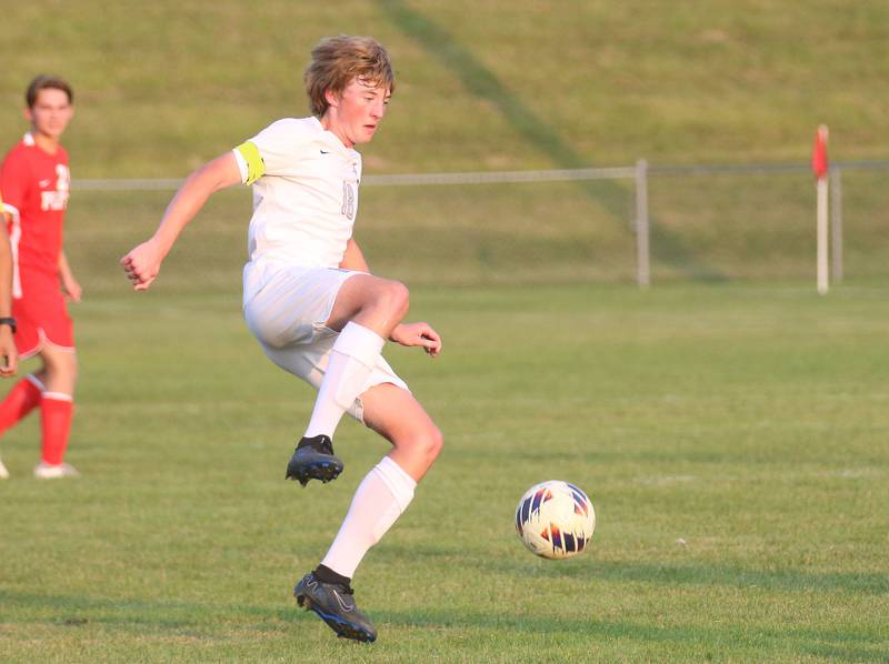 Kaneland's Matthew Mitchinson knocks the ball down against Ottawa on Wednesday, Sept. 11, 2024 at King Field.