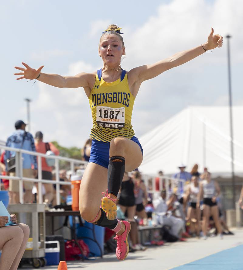 Johnsburg’s Lila Duck takes off in the 2A long jump Saturday, May 18, 2024 at the IHSA girls state track meet in Charleston.