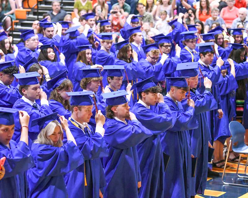 Genoa-Kingston High School seniors move their tassels from the right to left side at their graduation ceremony held on Saturday ,May 18, 2024, at the high school, 980 Park Ave. in Genoa.
