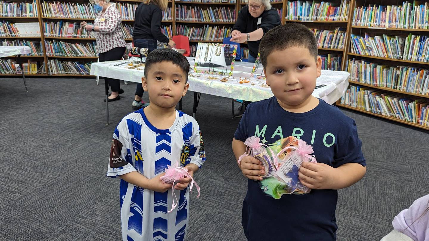 On April 15, volunteers from two Joliet nonprofits – the Zonta Club of Joliet and Visitation and Aid Society – hosted a “jewelry gift shop” of gently used bracelets earrings, necklaces for the students at Edna Keith, M.J. Cunningham Elementary, and Sator Sanchez and Thomas Jefferson elementary schools to give on Mother’s Day. Kyle Ly (left) and Tony Bonilla (right) show off their 