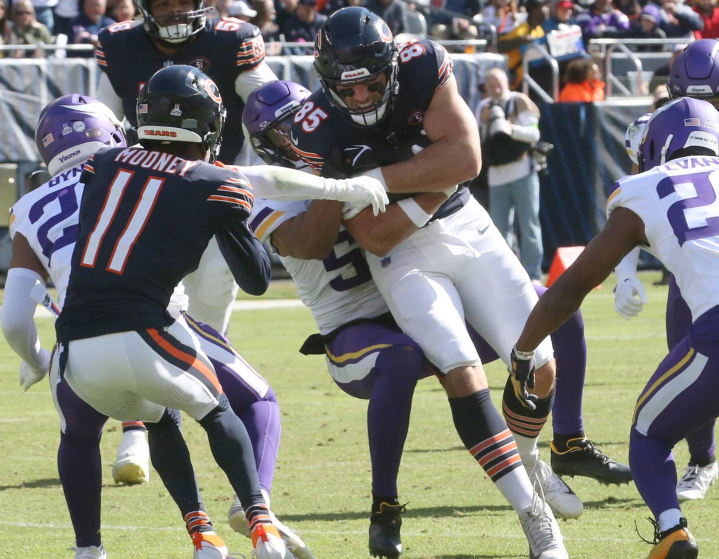 Chicago Bears tight end Cole Kmet makes a catch as he is brought down from behind by Minnesota Vikings linebacker Jordan Hicks on Sunday, Oct. 15, 2023 at Soldier Field.