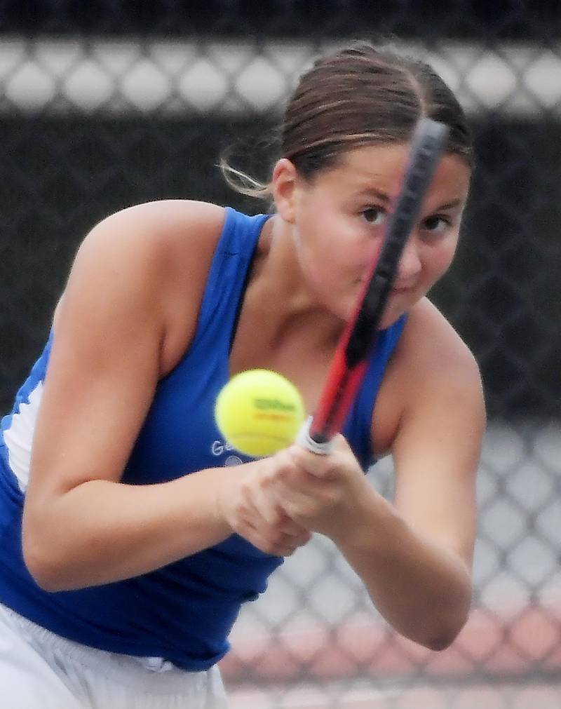 Geneva’s Corlett Klein returns a backhand against Wheaton Warrenville South’s Riley Lepsi in their singles match at the DuKane Conference girls tennis tournament at Wheaton Warrenville South High School on Thursday, October 5, 2023.