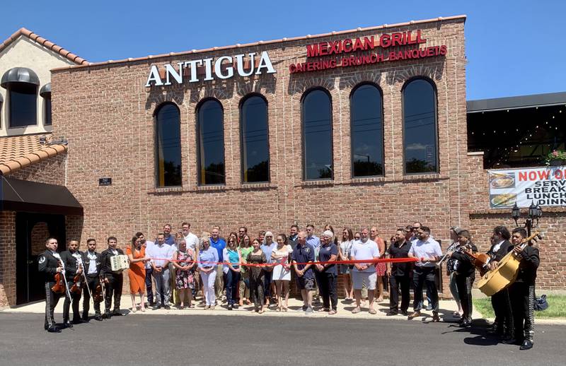 Luis Rodriguez celebrates the Grand Opening of his second restaurant, Antigua Mexican Brunch & Grill in Algonquin, along with his family, friends, staff, and the staff and board members of the Cary-Grove Area Chamber of Commerce and the Algonquin/Lake In the Hills Chamber of Commerce.