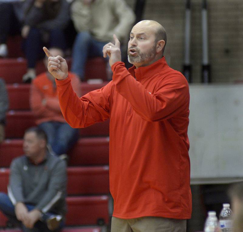 La Salle Peru Head Coach John Senica gives instructions during his first game coaching the Cavaliers against Streator during the Dean Riley Thanksgiving Tournament at Ottawa Tuesday.