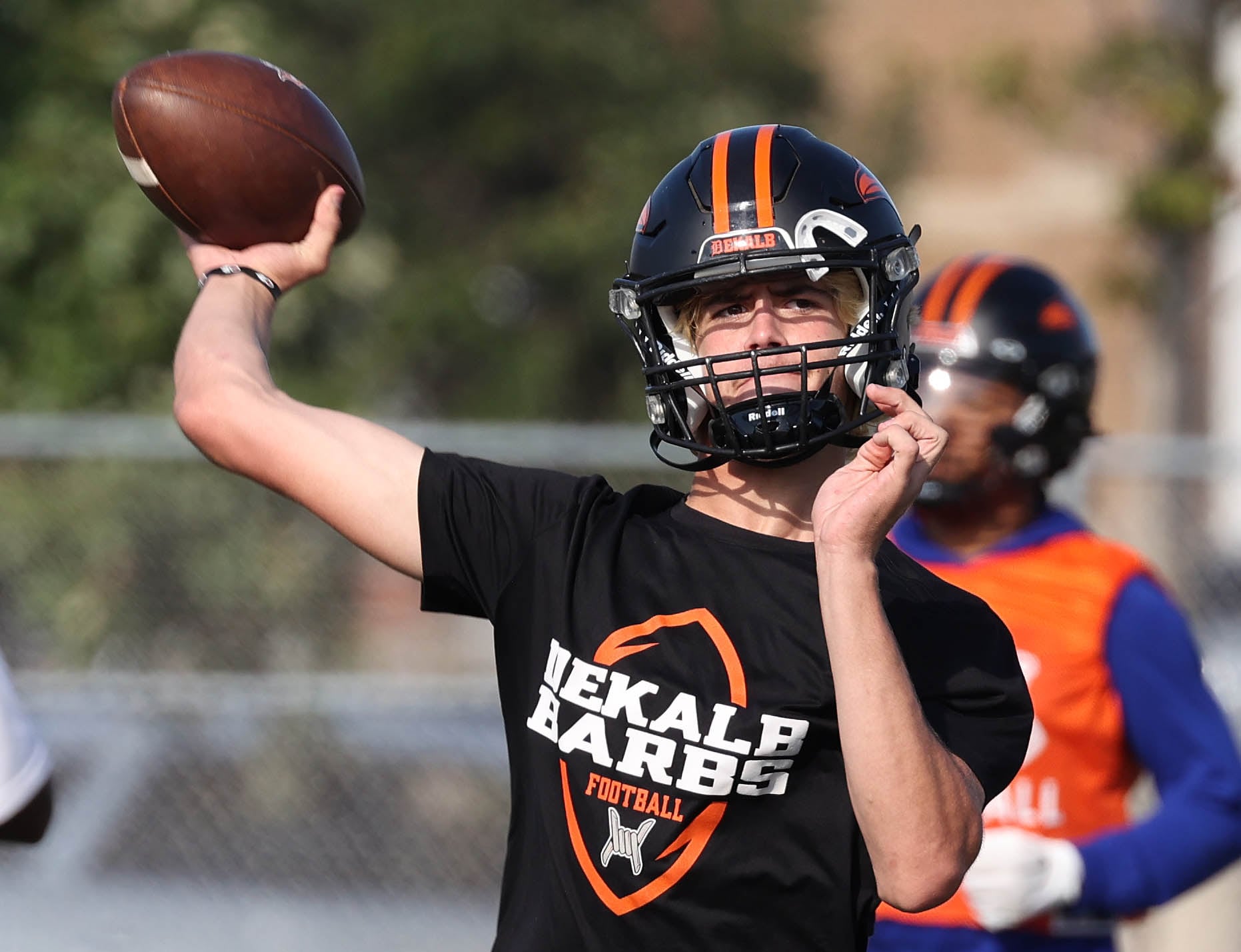 Dekalb quarterback Cole Latimer throws a pass Monday, Aug. 12, 2024, at the school during the first practice of the regular season.