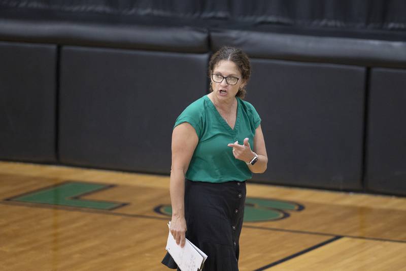 Rock Falls volleyball head coach Jolene Bickett talks to her team Thursday, Aug. 29, 2024, at Rock Falls High School.