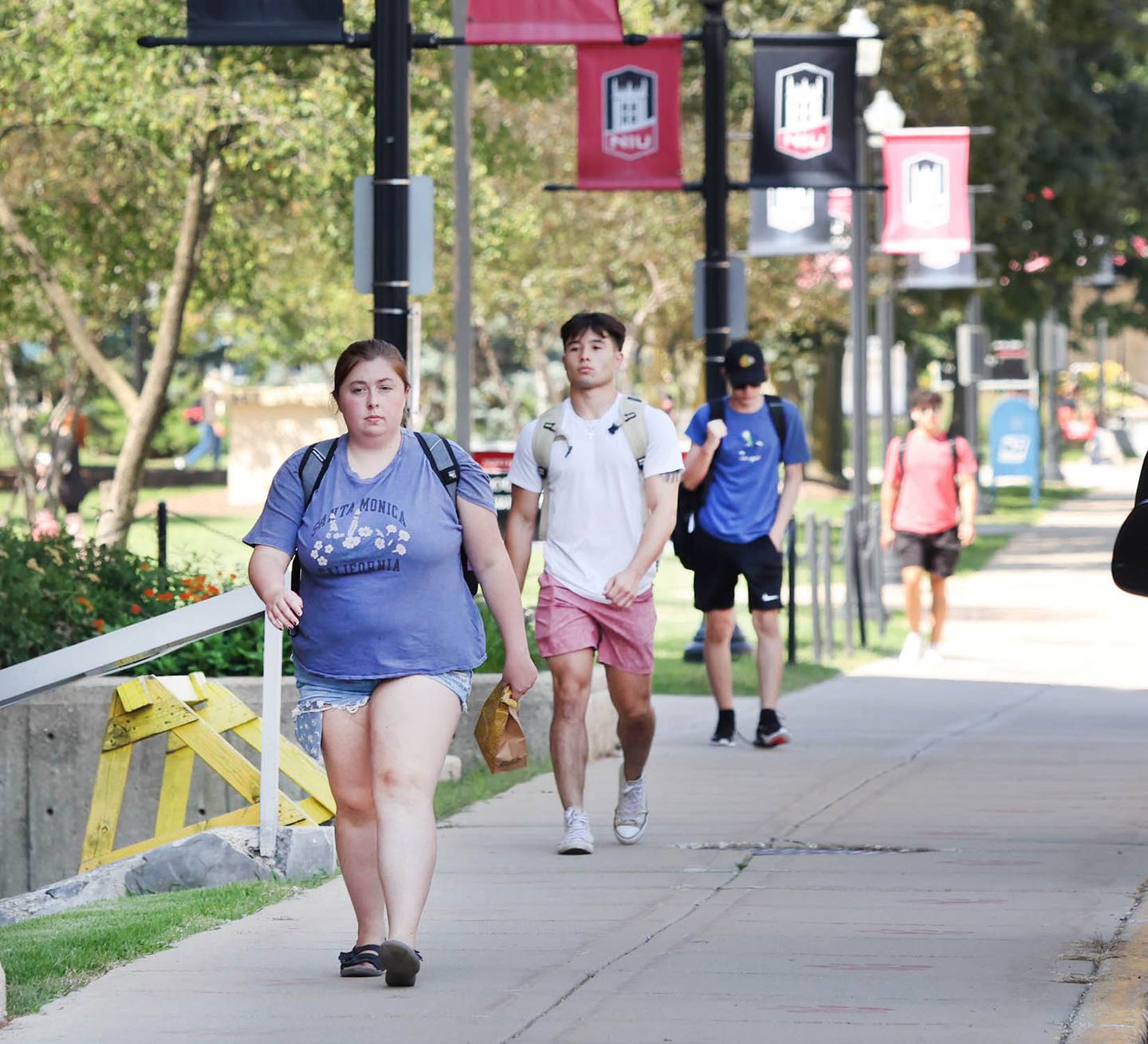 Northern Illinois University students move between classes Wednesday, Aug. 24, 2022, on campus at NIU in DeKalb.