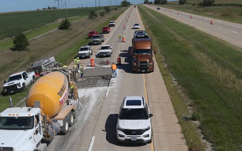 Crews pour a section of concrete Tuesday, Sept. 3, 2024, while doing patch work on Interstate 39 between Lostant and Tonica. The Illinois Department of Transportation will be do joint and pothole repair through November. Motorists are asked to use caution and expect delays when traveling through the work zones. The project is part of the Rebuild Illinois investing $33.2 billion into all modes of transportation across the state.