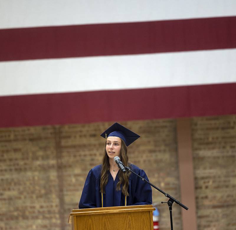 Sterling 2024 class president Emily Lofgren reminds her fellow graduates Friday, May 24, 2024 that when times are tough to find strength and “just keep swimming.”