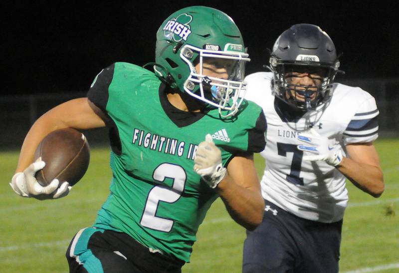 Seneca's Gunner Varland outpaces Lisle's Jayden Bae at Seneca on Friday, Sept. 6, 2024.