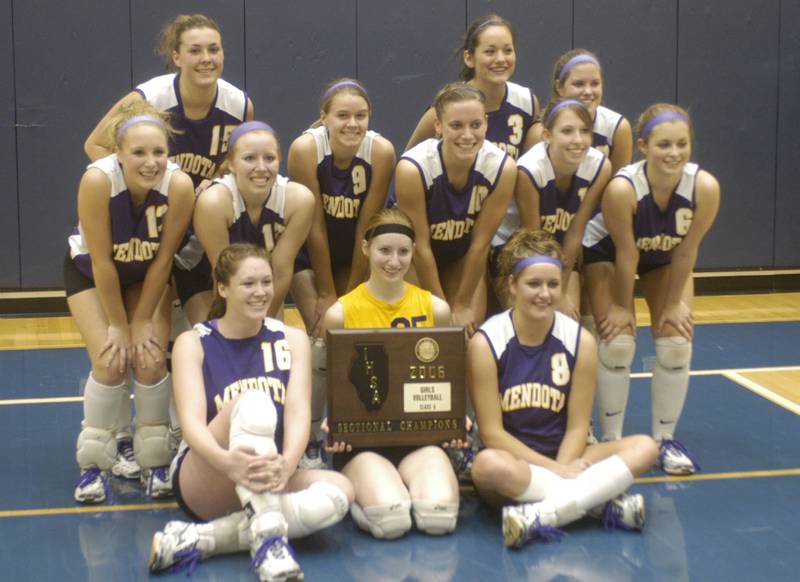 Members of the Mendota volleyball team pose with their Sectional plaque in 2006.