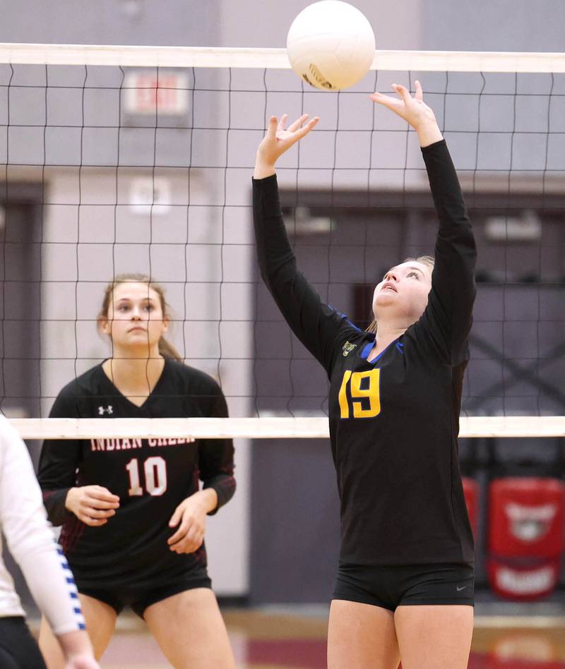 Somonauk's Riley Snider sets the ball during their regional first round match against Indian Creek Tuesday, Oct. 25, 2022, at Aurora Christian High School in Aurora.