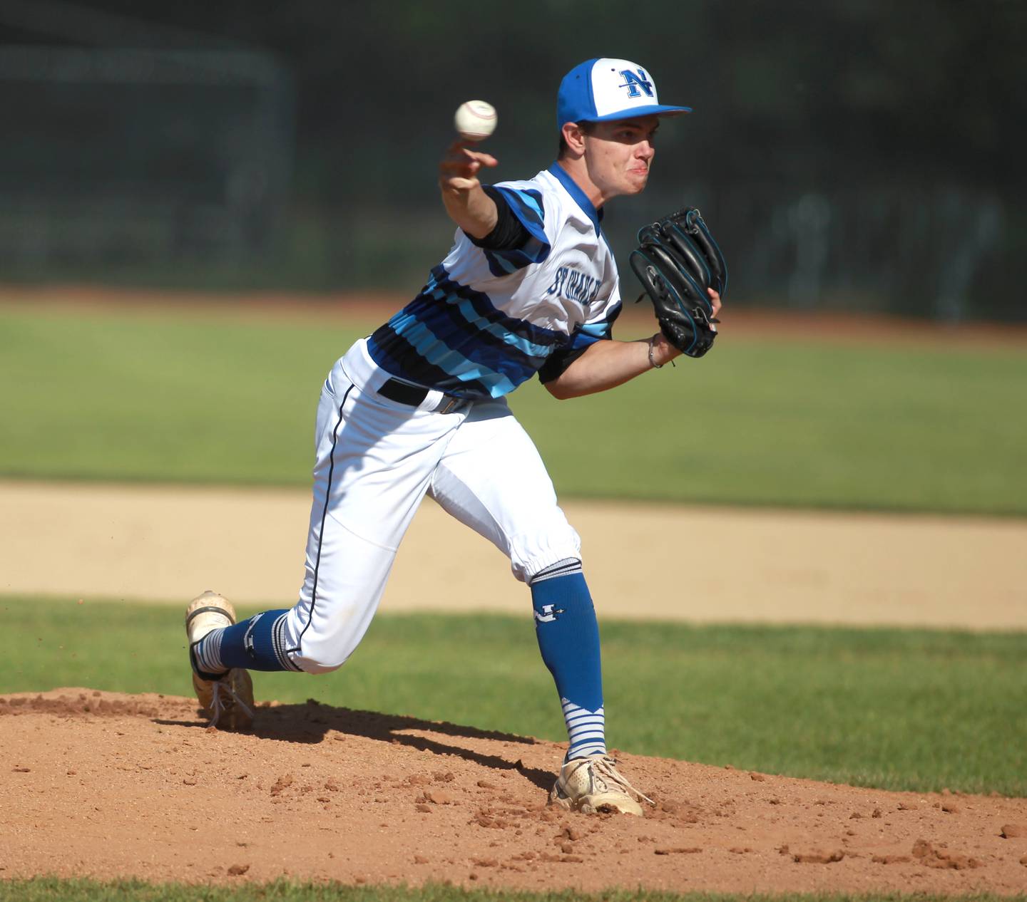 St. Charles North’s Josh Caccia pitches during a Class 4A St. Charles North Sectional semifinal game against South Elgin on Wednesday, May 29, 2024.