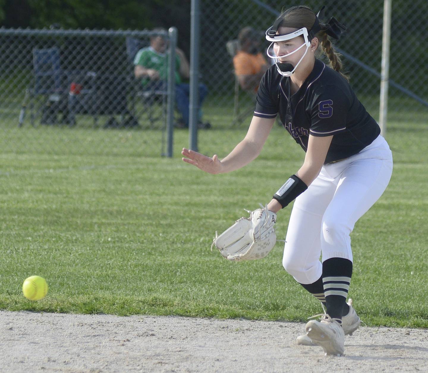 Serena shortstop Jenna Setchell sets to scoop up a ground ball against Newark on Wednesday, May 1, 2024 at Serena High School.
