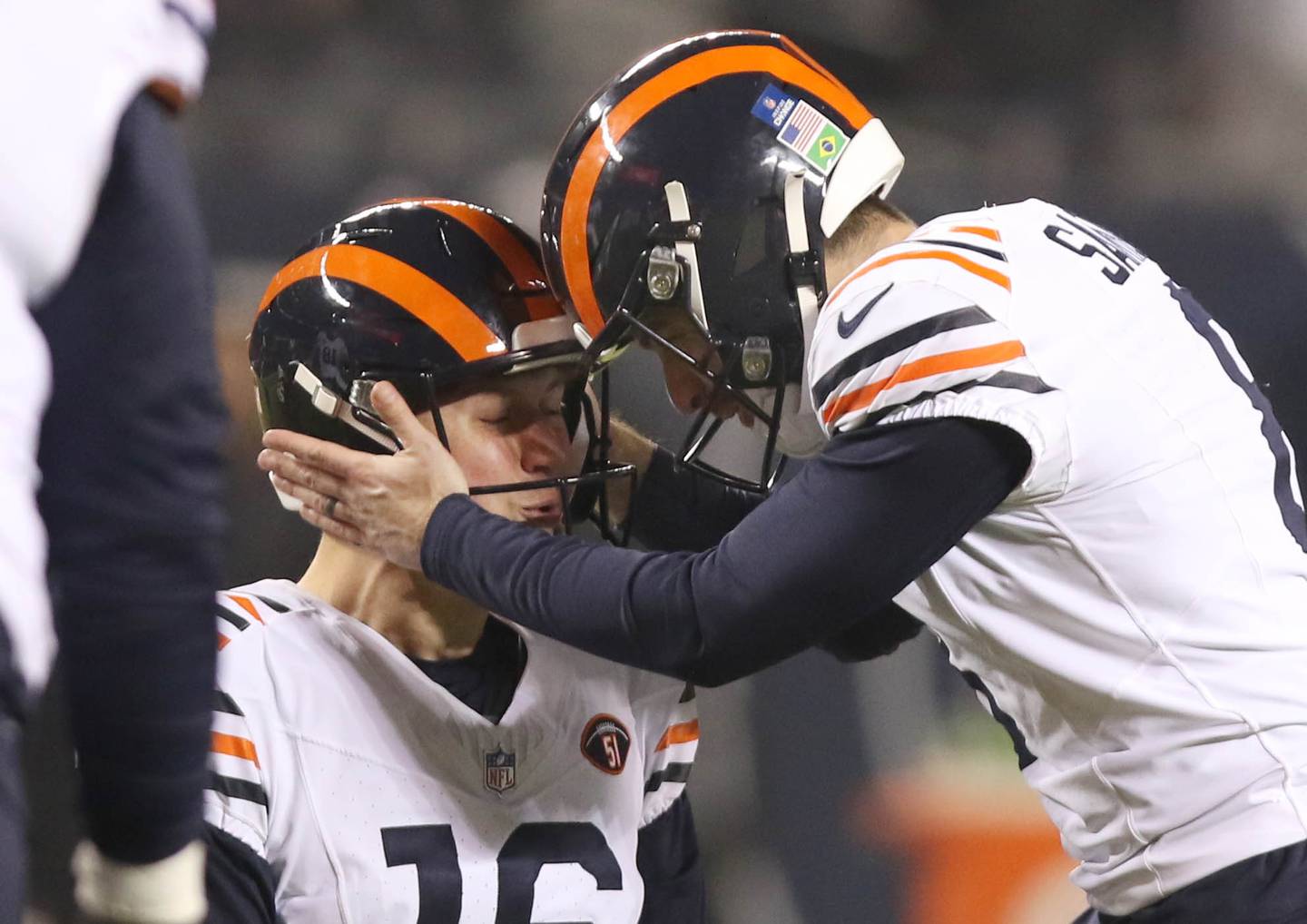 Chicago Bears place kicker Cairo Santos (right)  is congratulated after his field goal by his holder Chicago Bears punter Trenton Gill late in the fourth quarter of their game against the Arizona Cardinals Sunday, Dec. 24, 2023, at Soldier Field in Chicago.