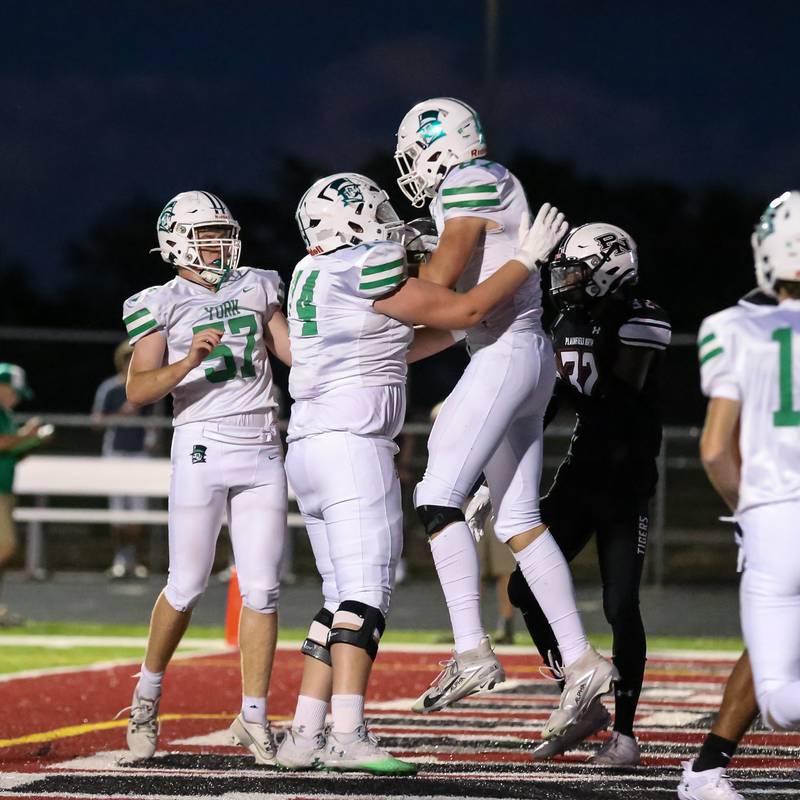 York's Hunter Stepanich (87) celebrates his touchdown catch with teammates during a football game between York at Plainfield North on Friday, Sept 6th, 2024 in Plainfield. Gary E Duncan Sr for Shaw Local News Network.