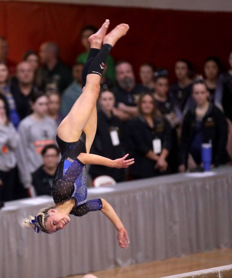 Wheaton Warrenville South’s Haylie Hinckley competes on the balance beam during the IHSA Girls State Gymnastics Meet at Palatine High School on Friday, Feb. 16, 2024.