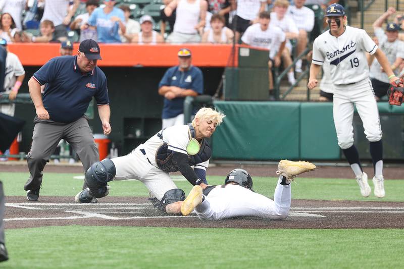 Lemont’ Noah Tomakas tags out Crystal Lake Central’s Tommy Korn at the plate in the IHSA Class 3A Championship game on Saturday June 8, 2024 Duly Health and Care Field in Joliet.