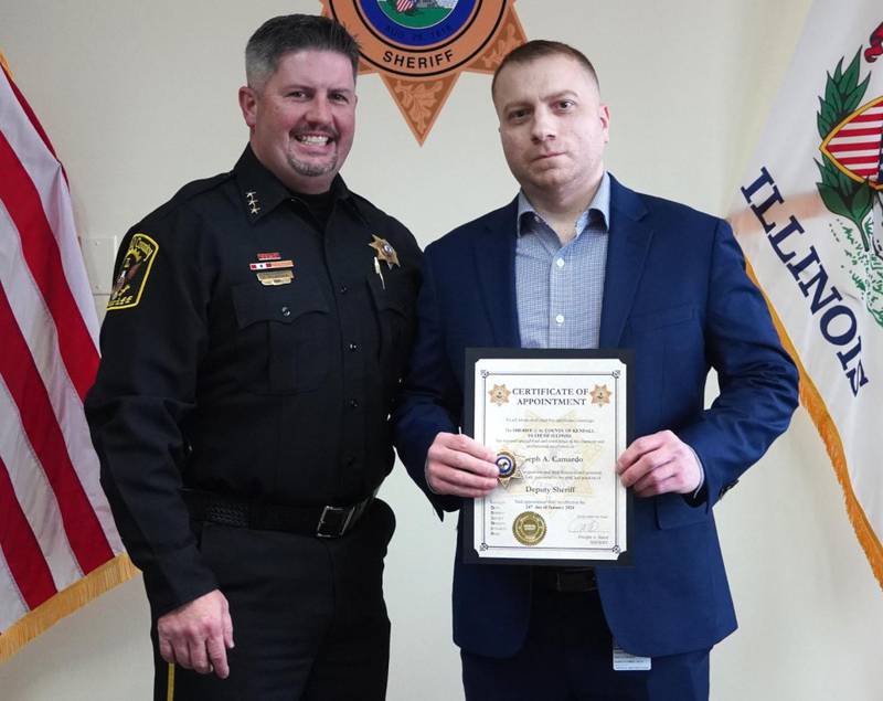 Kendall County Undersheriff Bobby Richardson, left, with new deputy Joseph Camardo.