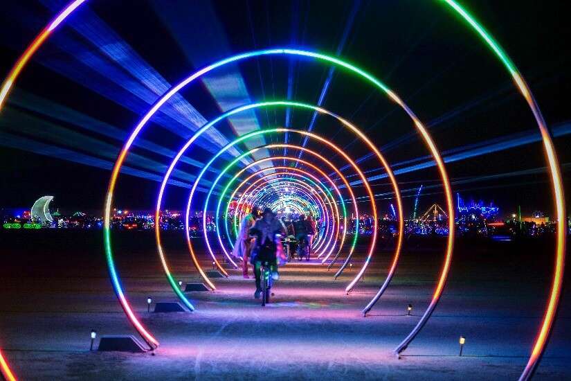 The Sonic Runway is a light-art installation that transforms audio signals into patterns of light, shooting down a 400-foot corridor of 23 LED-lined arches at the speed of sound. It was created by Rob Jensen and Warren Trezevant.