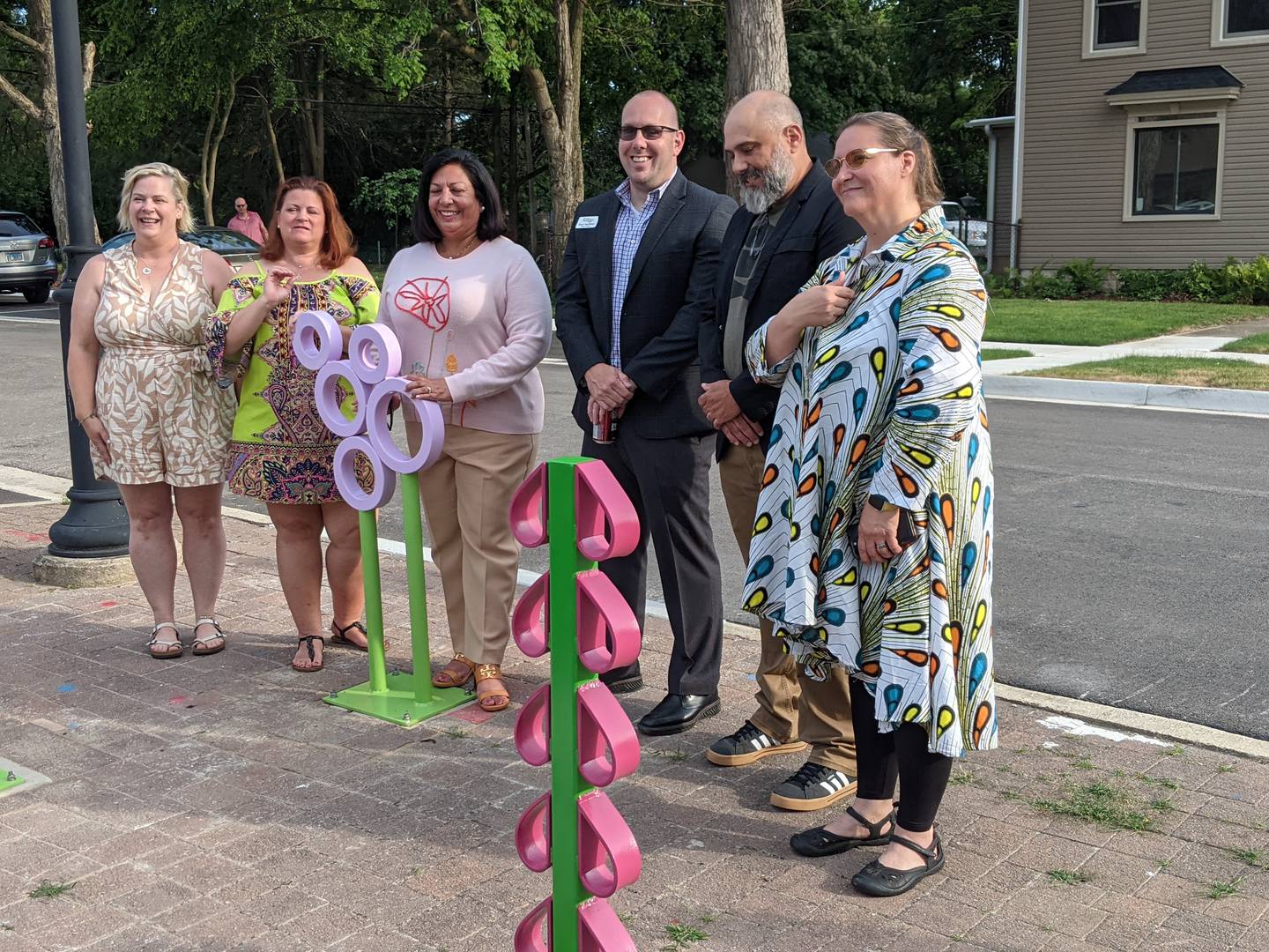 Oswego Village President Ryan Kauffman and members of the Oswego Cultural Arts Commission on June 27 celebrated two new outdoor public art projects in downtown Oswego.