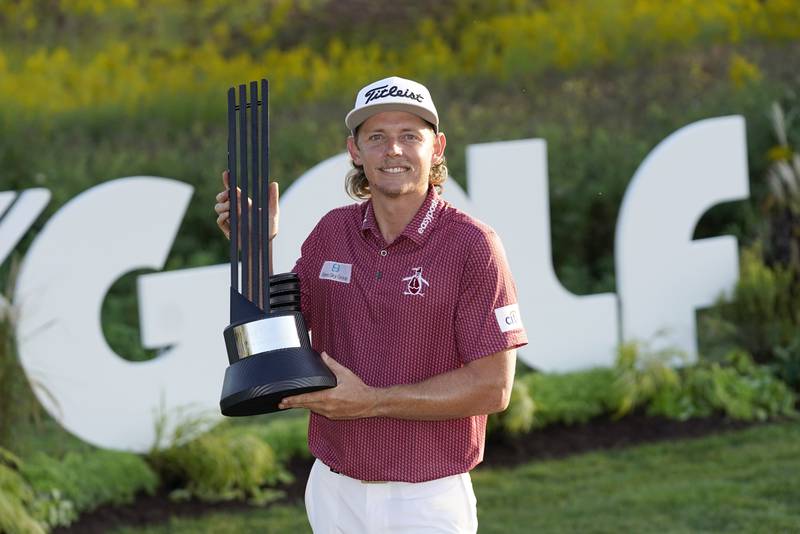 Cameron Smith poses with the champion's trophy after winning the LIV Golf Invitational-Chicago tournament Sunday, Sept. 18, 2022, at Rich Harvest Farms in Sugar Hill.