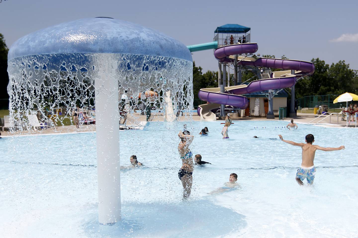 People enjoy the water while swimming on Friday, June 21, 2024, at the Woodstock Water Works.