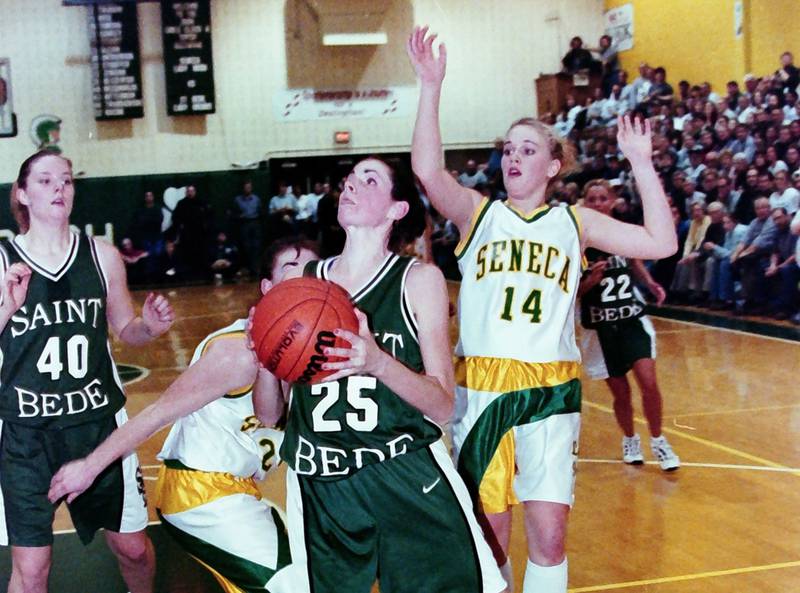 St. Bede's Sarah Slevin dribbles past a Seneca player during the Supersectional game on Feb. 21, 2000.