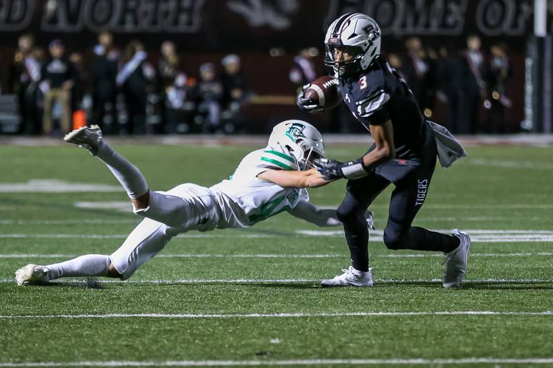 Plainfield North's Darin Ashiru (3) spins away out of a tackle attempt during a football game between York at Plainfield North on Friday, Sept 6th, 2024 in Plainfield. Gary E Duncan Sr for Shaw Local News Network.