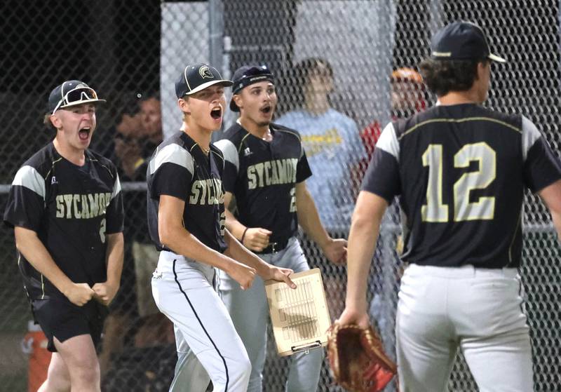 Sycamore players celebrate the end of the eighth inning during the Class 3A sectional final game against Burlington Central Friday, May 31, 2024, at the Sycamore Community Sports Complex.