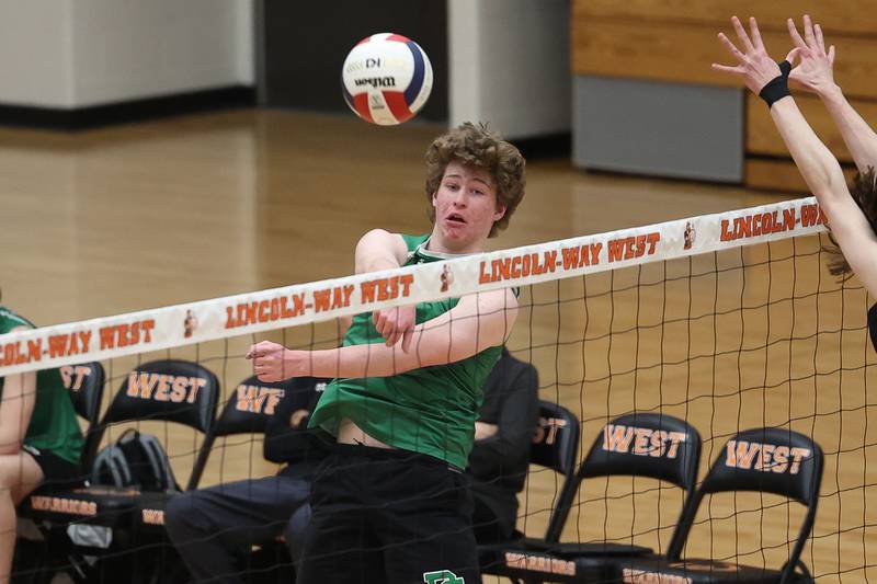 Providence’s Sean Dovin hits a shot against Lincoln-Way West on Wednesday, April 3, 2024 in New Lenox.