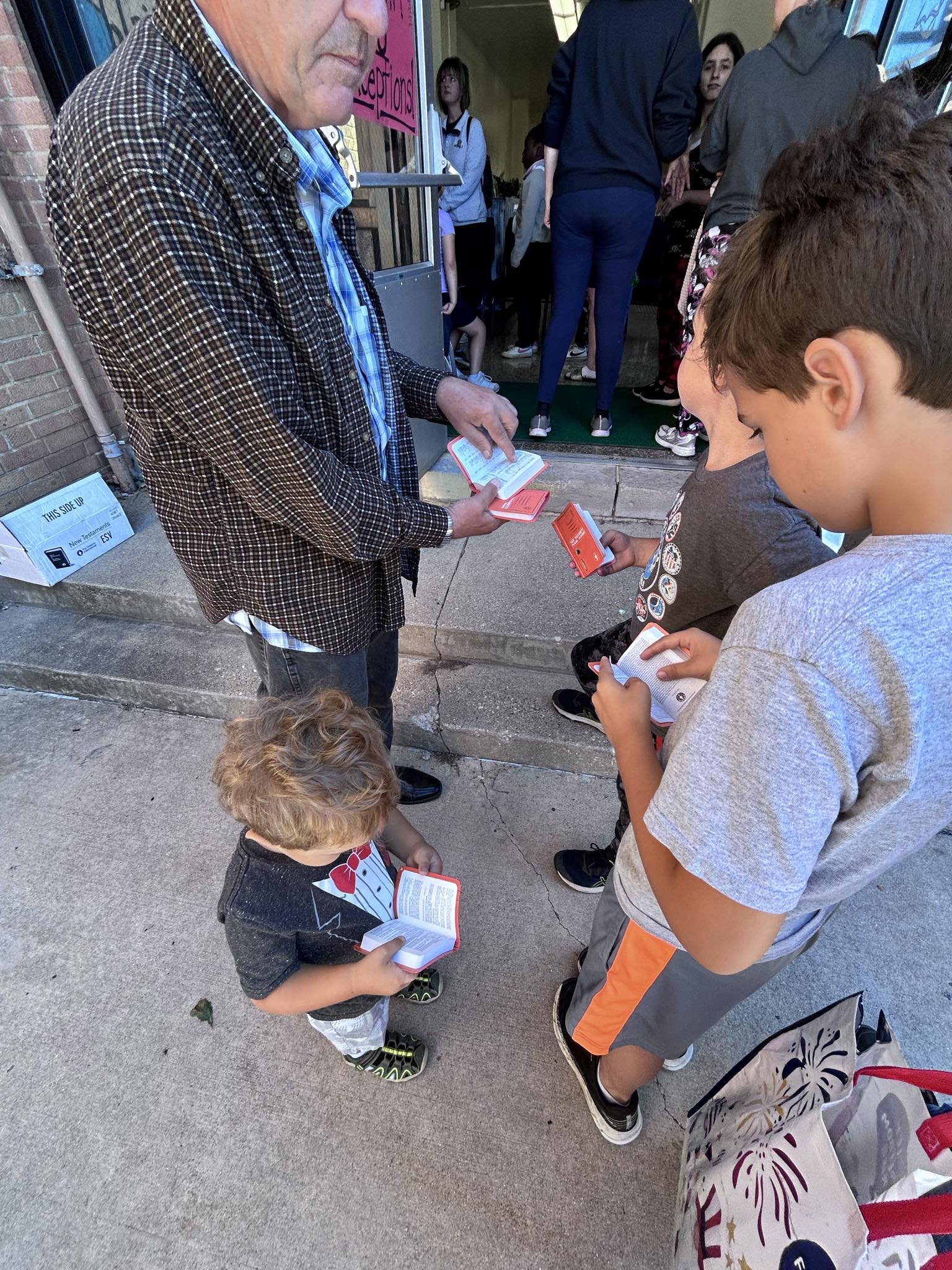 Children reading bibles at Streator's fourth annual Back to School Fair from Saturday, Aug. 10, at the Oakland Park Commons, 701 S. Sterling St.