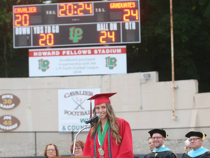 La Salle-Peru Township High School salutatorian Isabelle Andrews delivers a speech during the 126th annual commencement graduation ceremony on Thursday, May 16, 2024 in Howard Fellows Stadium.