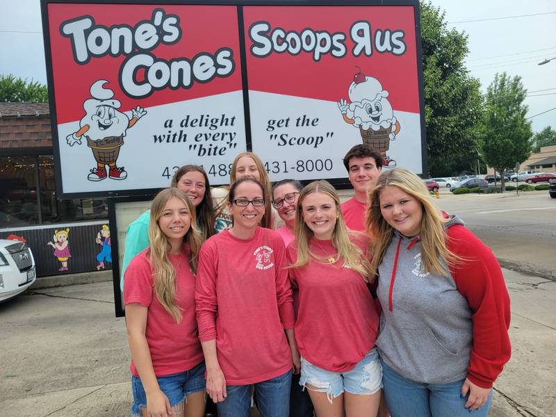 Leslie Shanley (front, second from left), owner of Tomes Cones, has announced the July 6 opening of Scoops R Us, a hard ice cream shop next to Tones Cones. With her are her employees Selena Gomez, Madison Brue and Addyson Campagna; (back) Peyton Bryson, Gabby Panepinto, Megan Baumgartner and Brandon Wilson.