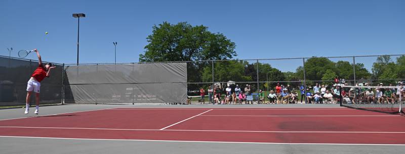 Marmion Academy’s Benedict Graft serves during the Class 1A singles final of the boys state tennis tournament at Palatine High School on Saturday, May 25, 2024 in Palatine.