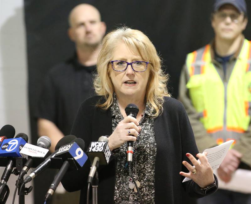 Christine Pozzi Public Health Administrator for the LaSalle County Health Department, addresses the media at the Grove Center regarding the Carus Chemical fire on Thursday, Jan. 12, 2023 in La Salle.