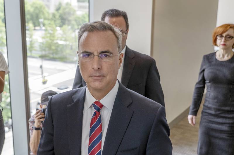 Pat Cipollone, the former White House counsel under President Donald Trump, walks to a conference room for a break from an interview room in the Ford House Office Building while answering questions from investigators with the Jan. 6 Select Committee, on Capitol Hill in Washington, Friday, July 8, 2022. (AP Photo/Gemunu Amarasinghe)