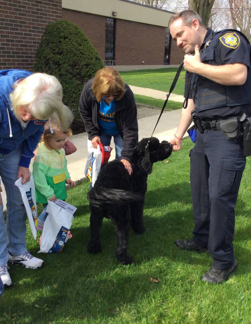 Rookie, the Ottawa Police Department's therapy dog, was the star of the show Wednesday, April 10, 2024, during the police department's visit for National Library Week.