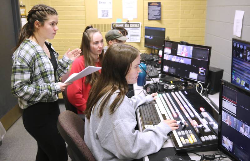 Sycamore High School students do studio work in the control room during the taping of a news program Wednesday, March 1, 2023, at the school.