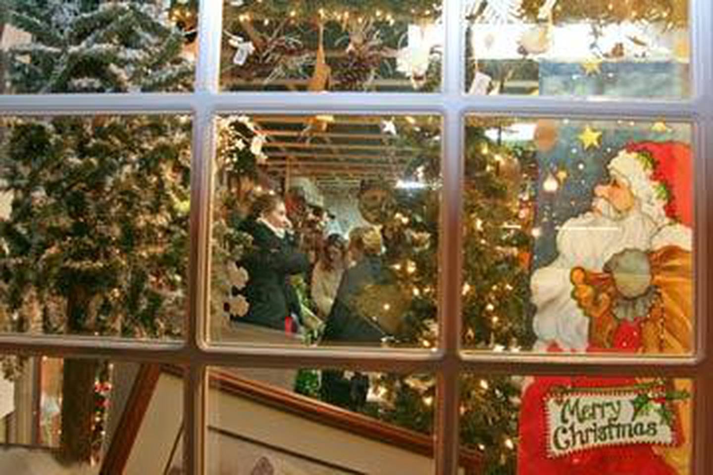 Customer's crowd a downtown Morris store as they shop for bargains Friday Night, during the fifth annual Midnight in Morris event. (Herald Photo/Heidi Terry-Litchfield)